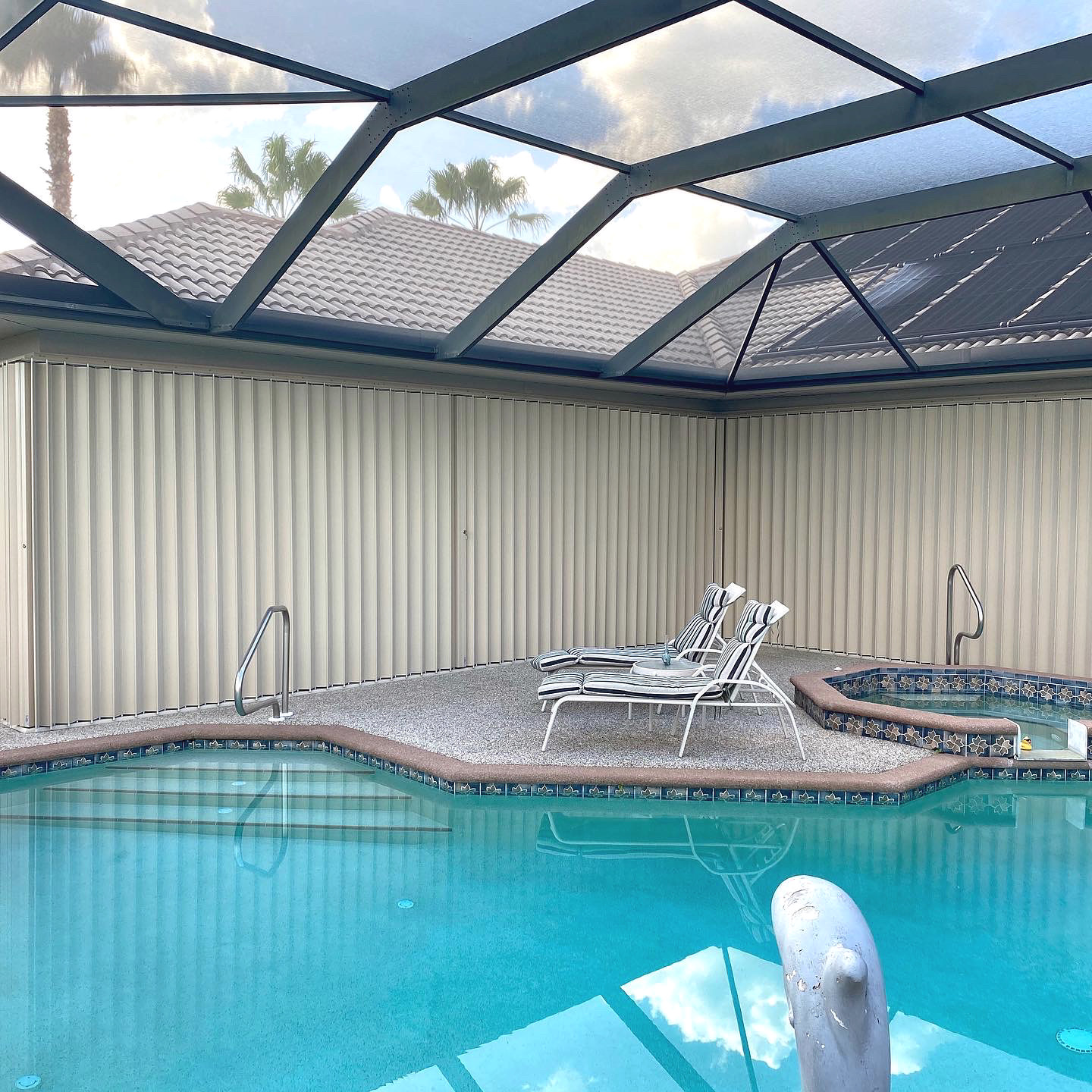 Installed Accordion Shutters Pool - Shutters239